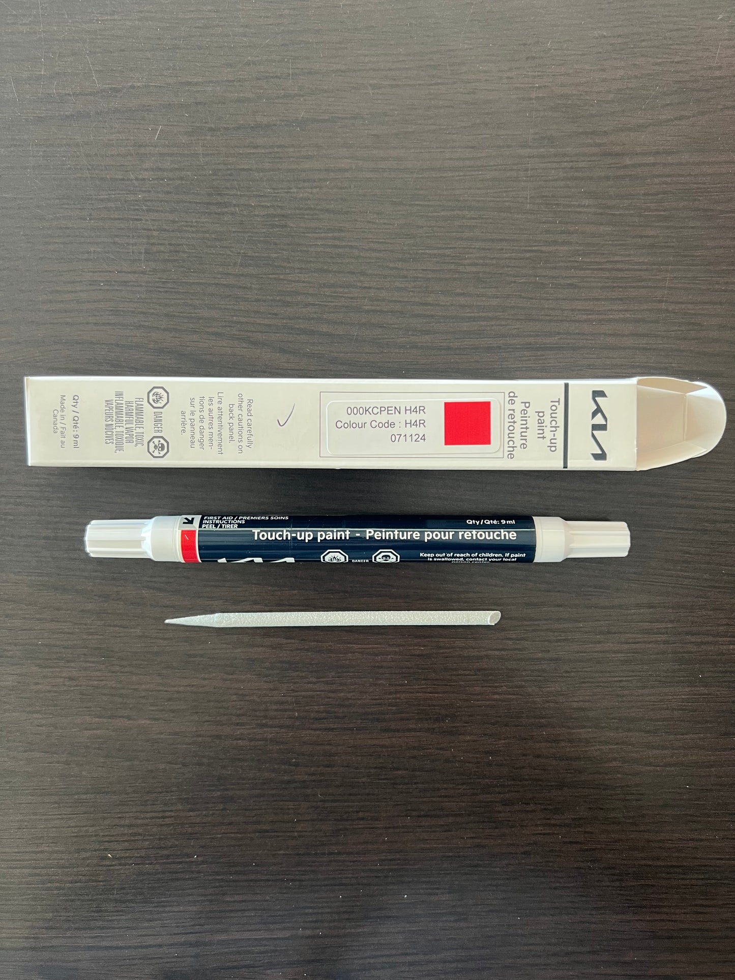 kia canada touch up california red pait pen h4r on wooden surface for stone chips