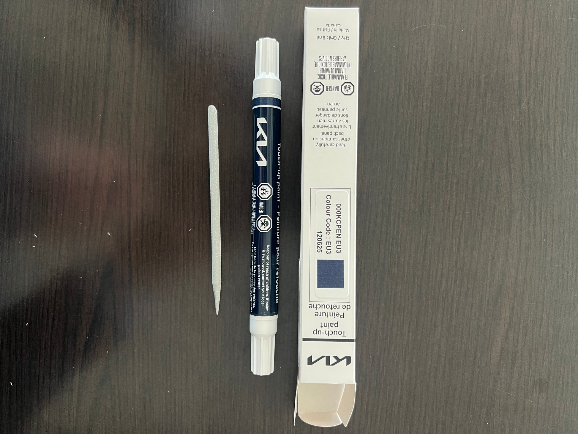 Kia Canada touch up ice blue paint pen eu3 on wooden surface for stone chips