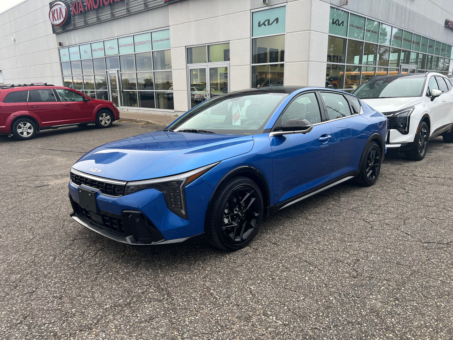 2025 Kia K4 LX EX GT Line wave blue Orangeville Kia web