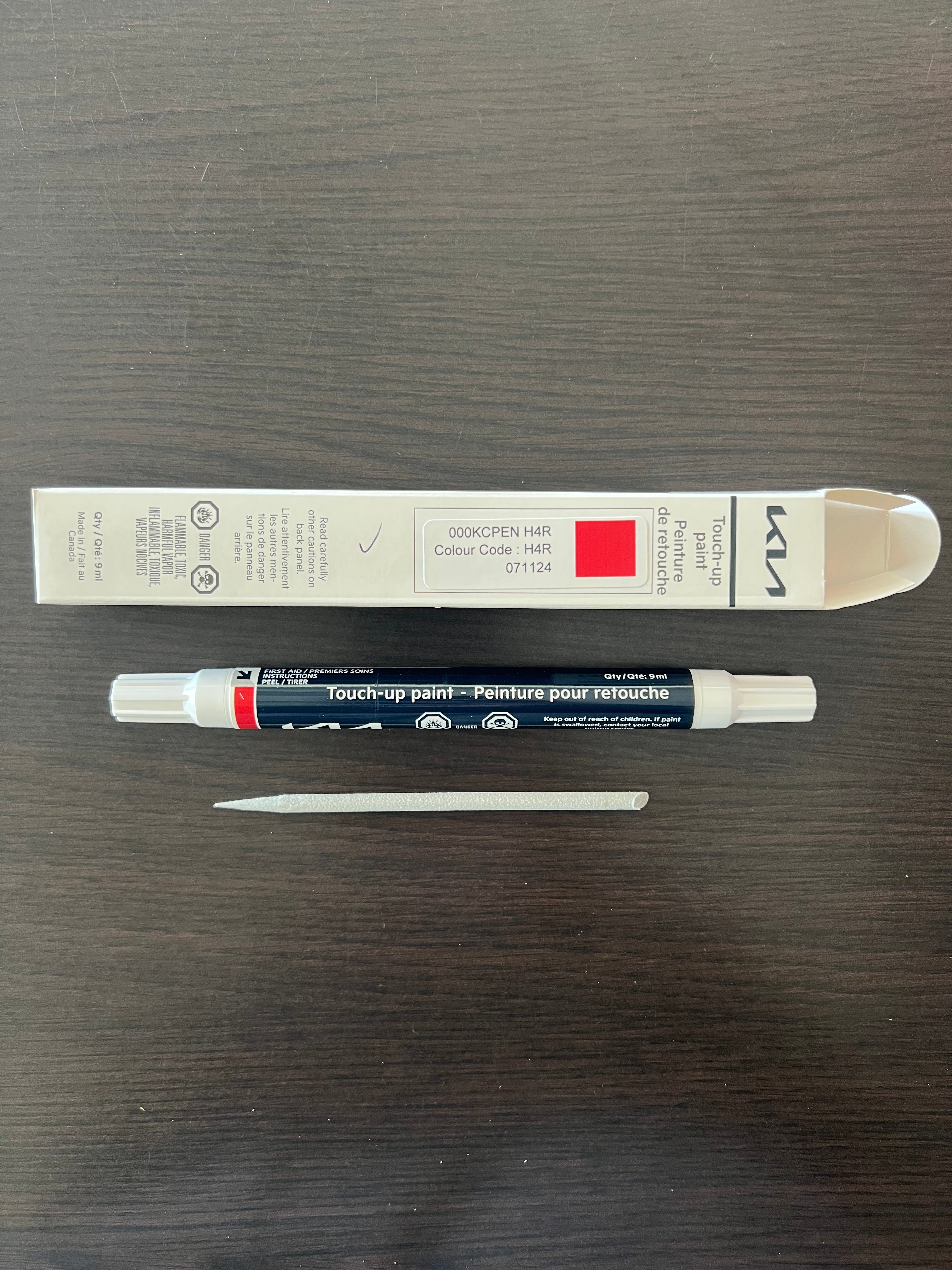 kia canada touch up california red pait pen h4r on wooden surface for stone chips