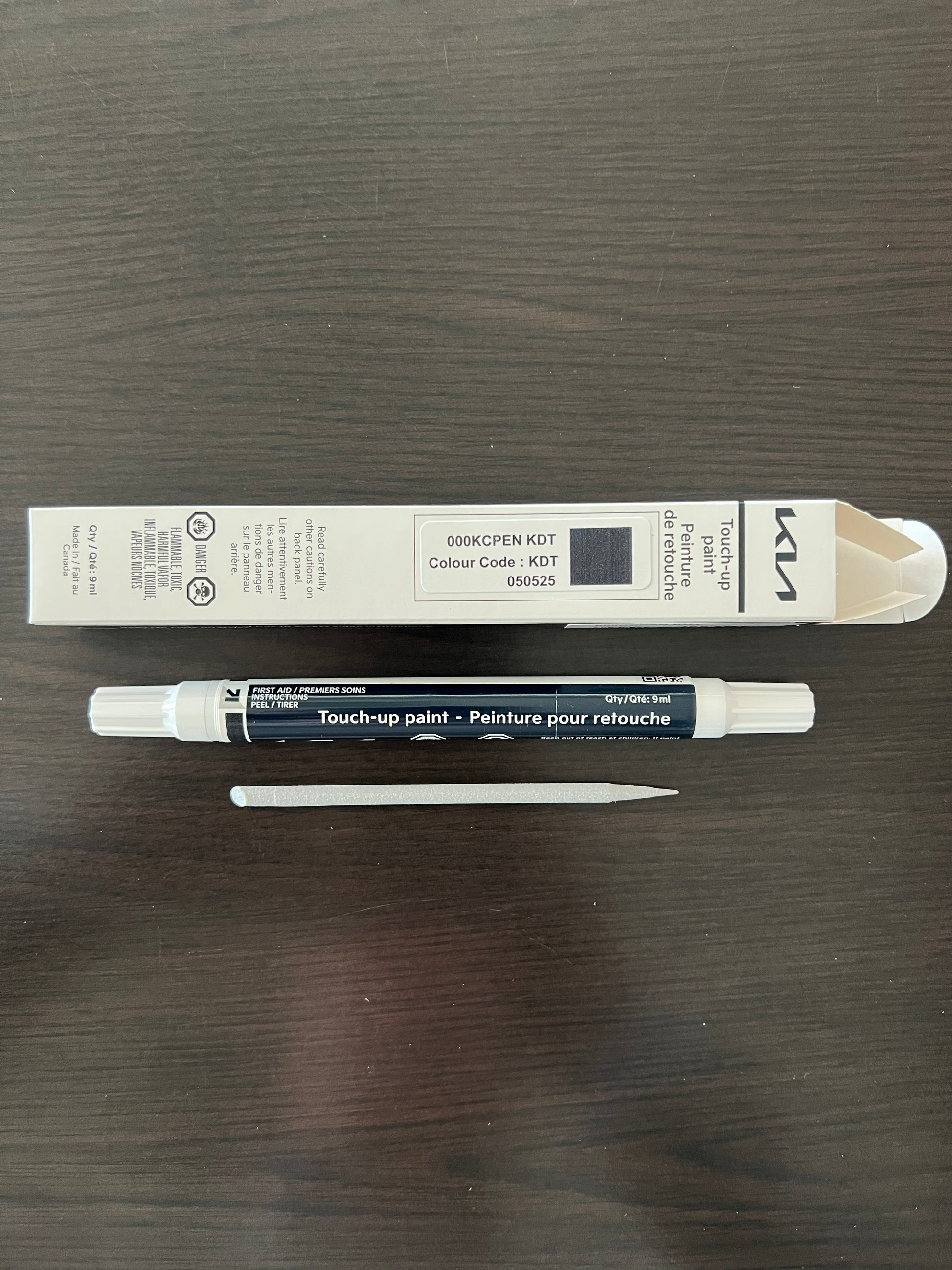 kia canada touch up gravity grey paint pen kdt on wooden surface for stone chips