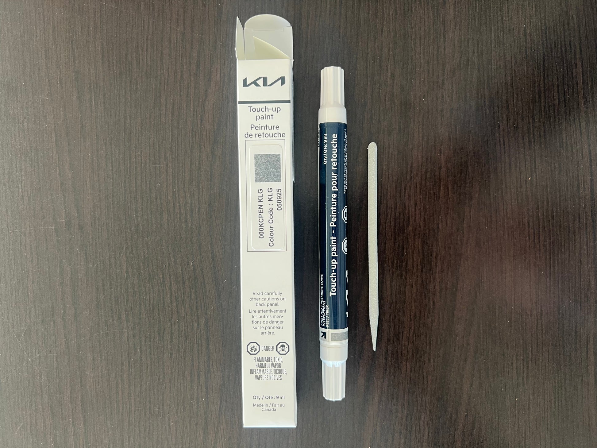 Kia canada touch up steel grey paint pen klg on wooden surface for stone chips